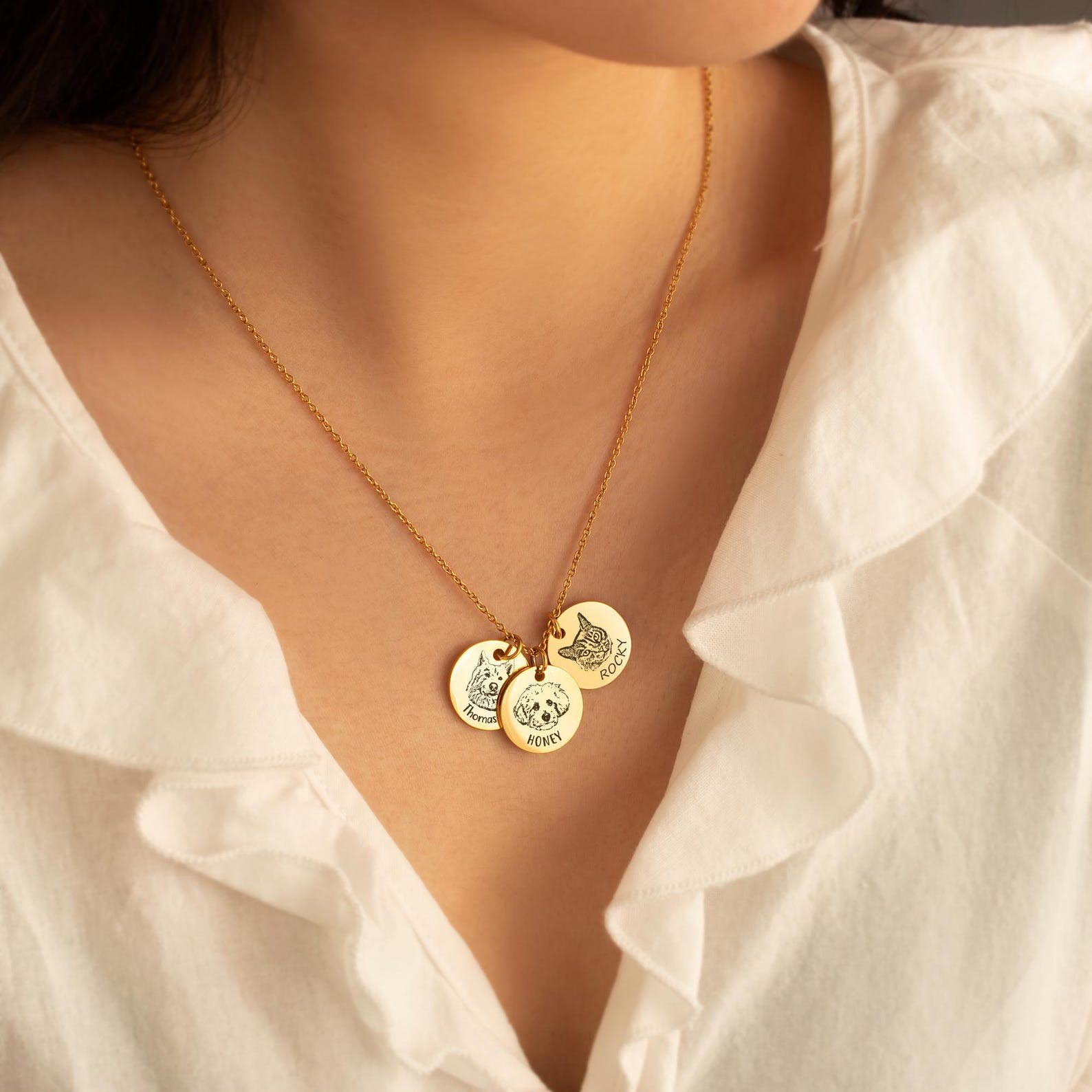 Personalized gold round disc pet portrait engraved necklace on model, custom dog cat sketch pendant with pet name, pet lover memorial jewelry