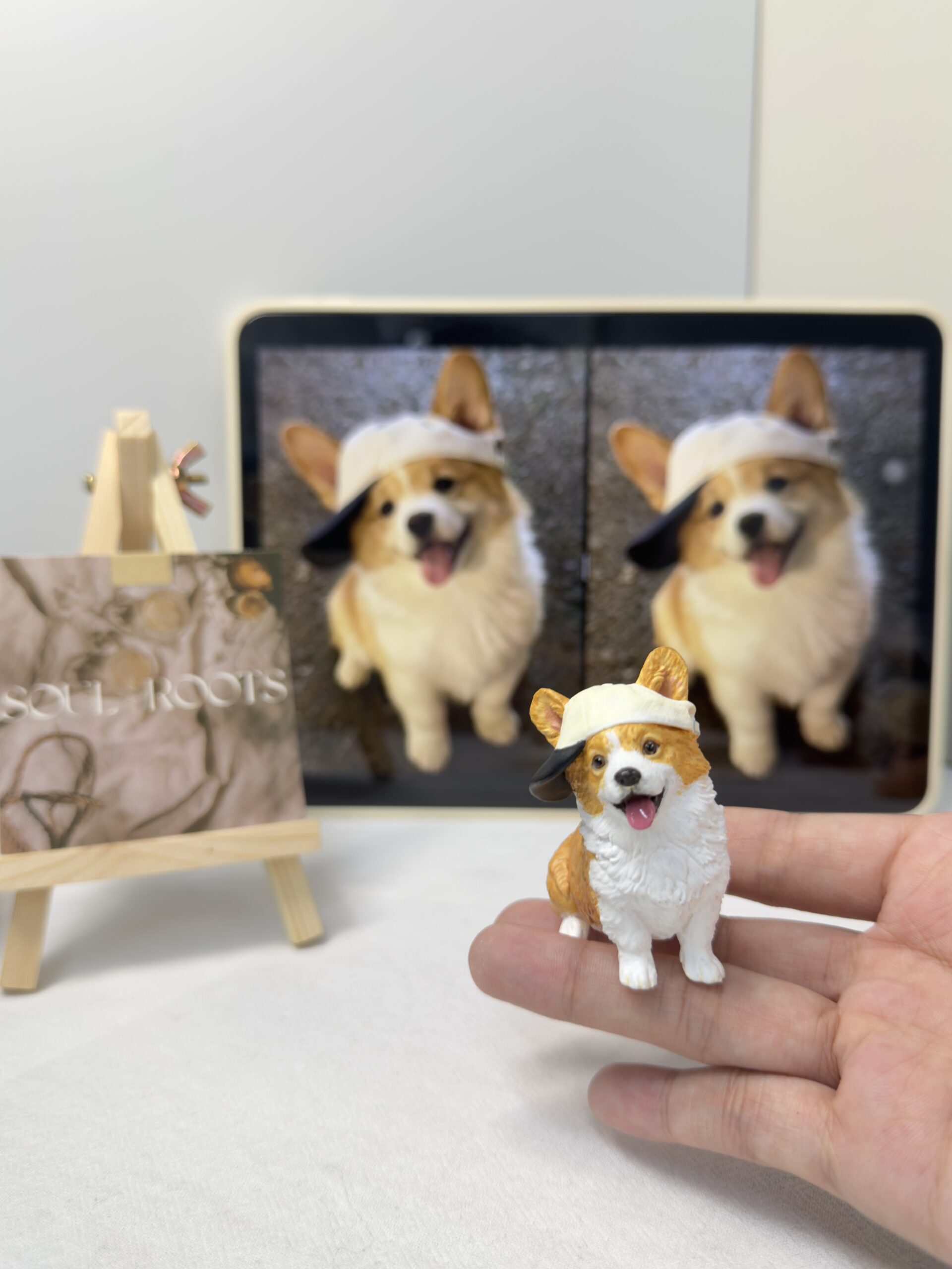 Small custom resin corgi pet figurine, baseball cap, hand held, customer photo on tablet, personalized pet memorial gift