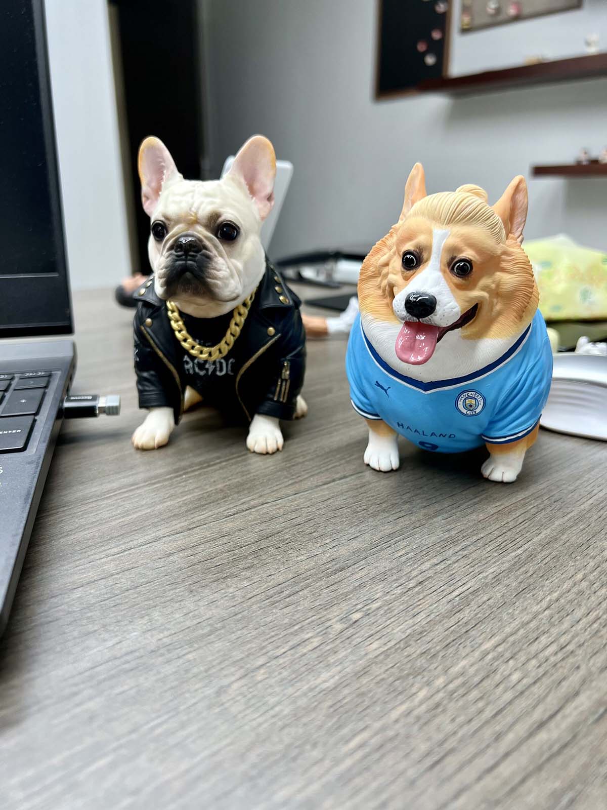 Two custom resin pet figurines, french bulldog leather jacket, corgi football jersey, personalized dog statues