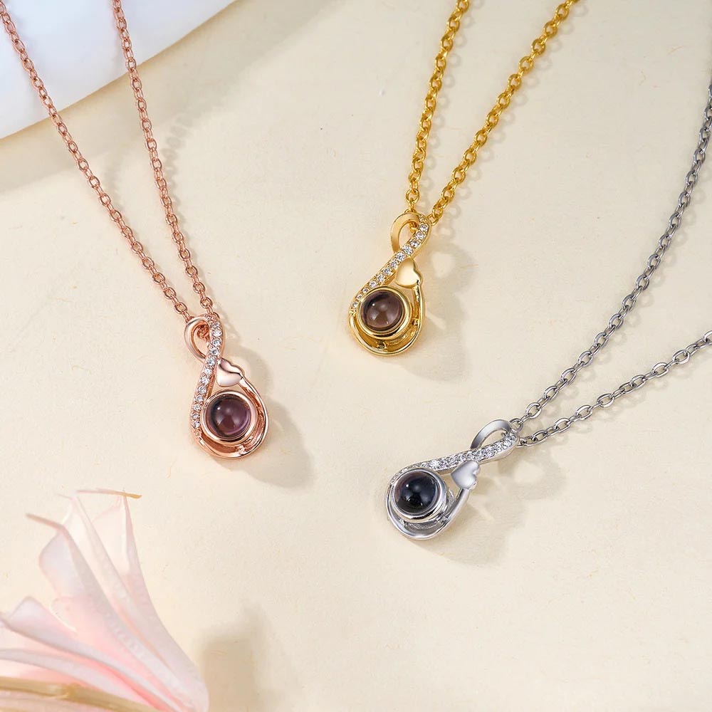Personalized infinity photo projection necklaces in gold, rose gold and silver, figure eight pendant with hidden picture
