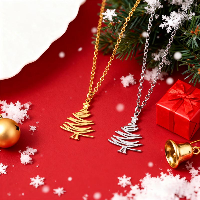Open outline Christmas tree necklaces in gold and silver on red holiday background with ornaments