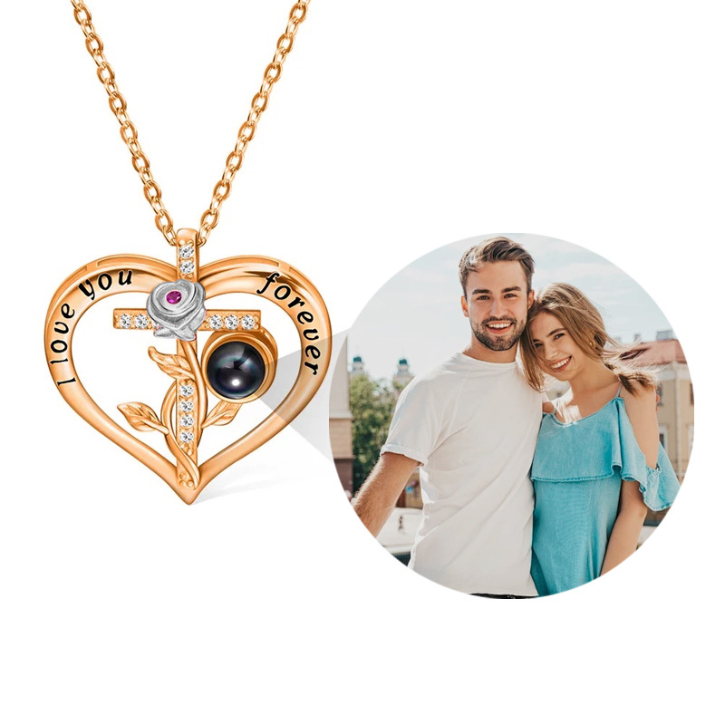 Rose gold personalized heart rose cross picture necklace, showing projected couple photo inside crystal
