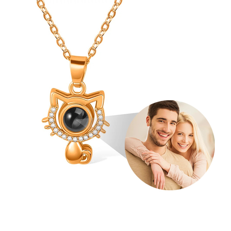 Rose gold cat picture projection necklace, front view of kitty pendant with projected photo