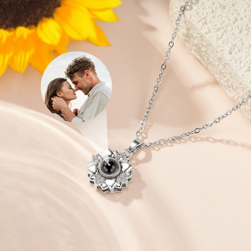 Silver sunflower heart petals projection necklace, couple photo projecting from center crystal with sunflower background