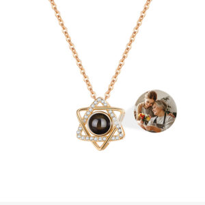 Gold Star of David photo projection necklace on white, mother daughter photo projecting from crystal